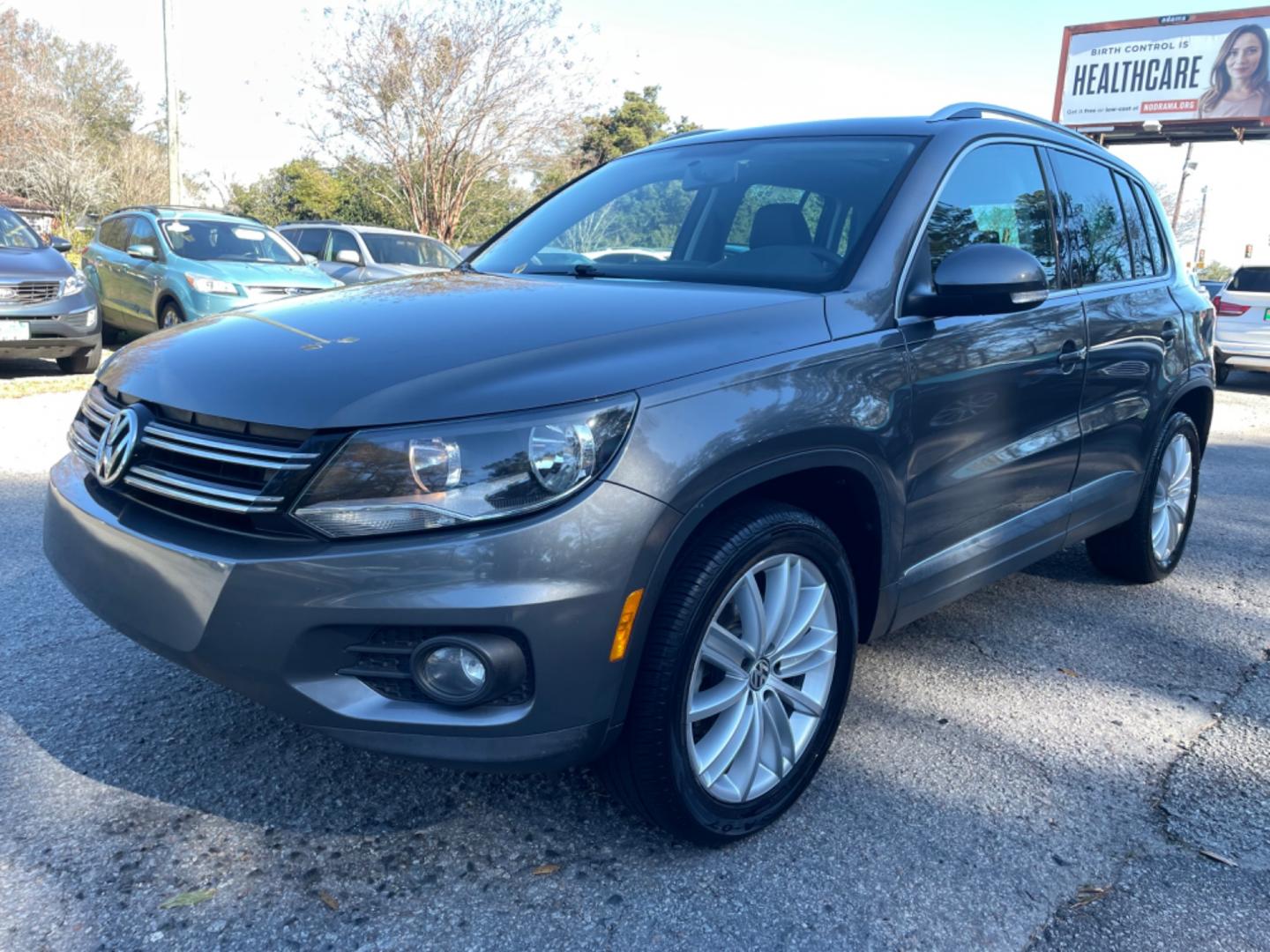 2015 GRAY VOLKSWAGEN TIGUAN S (WVGAV7AX3FW) with an 2.0L engine, Automatic transmission, located at 5103 Dorchester Rd., Charleston, SC, 29418-5607, (843) 767-1122, 36.245171, -115.228050 - Photo#2